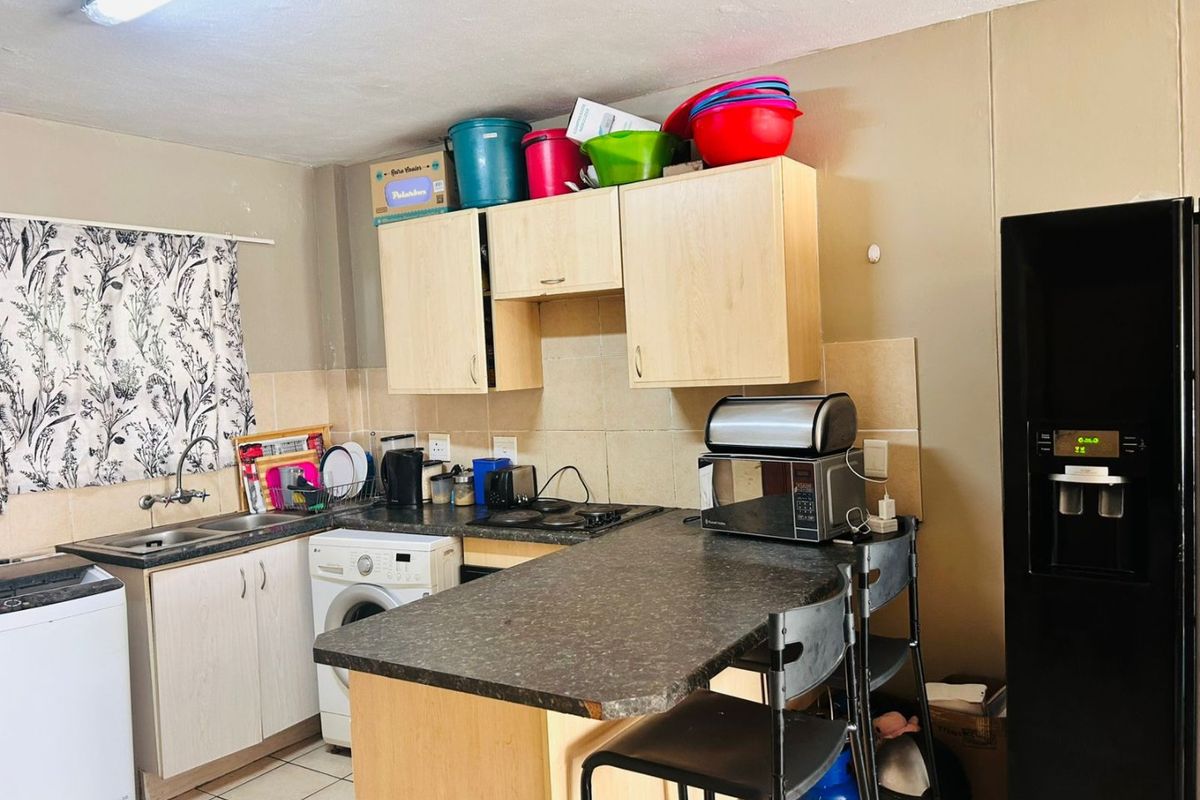 Neat and Secure 2-Bedroom Apartment in a Popular Complex - Photo 5