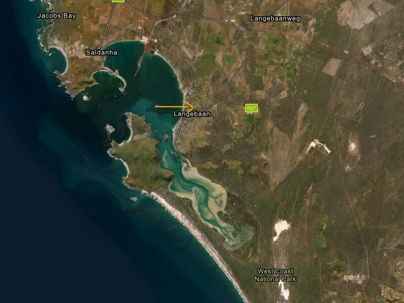 An aerial satellite view showing the geographical location of Langebaan, including the coastline, lagoon, and surrounding regional road infrastructure.