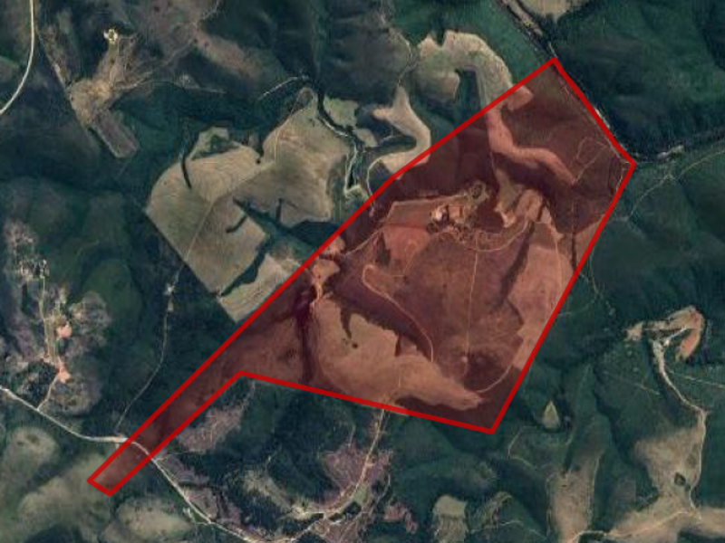 An aerial satellite view showing the expansive land parcel and property boundaries of the farm.