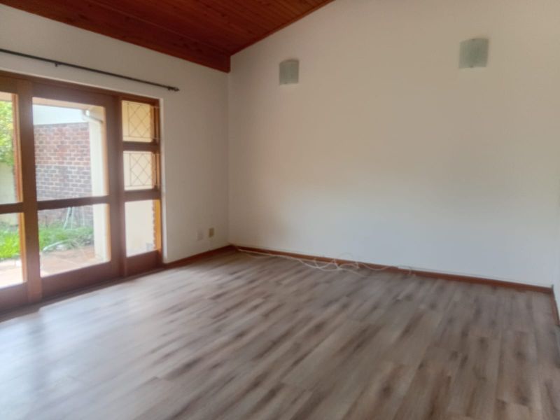 Spacious 3-Bedroom Home with Versatile Living Areas - Photo 2