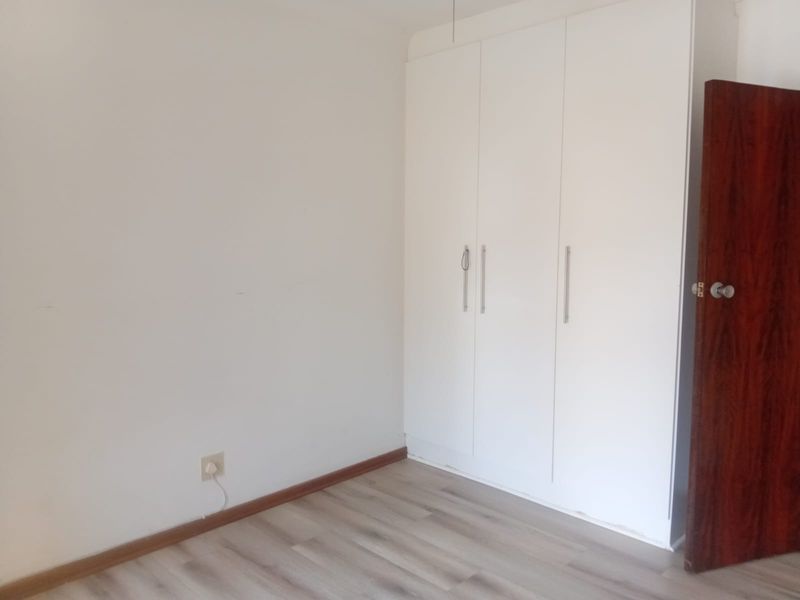 Spacious 3-Bedroom Home with Versatile Living Areas - Photo 10