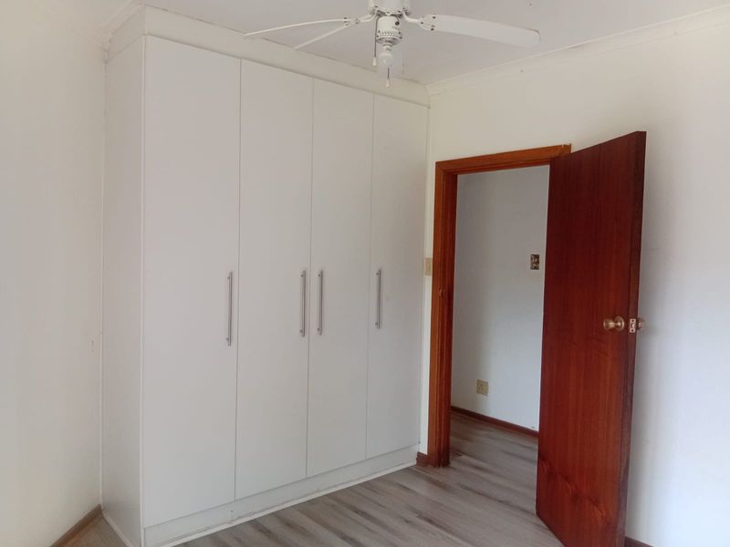 Spacious 3-Bedroom Home with Versatile Living Areas - Photo 7