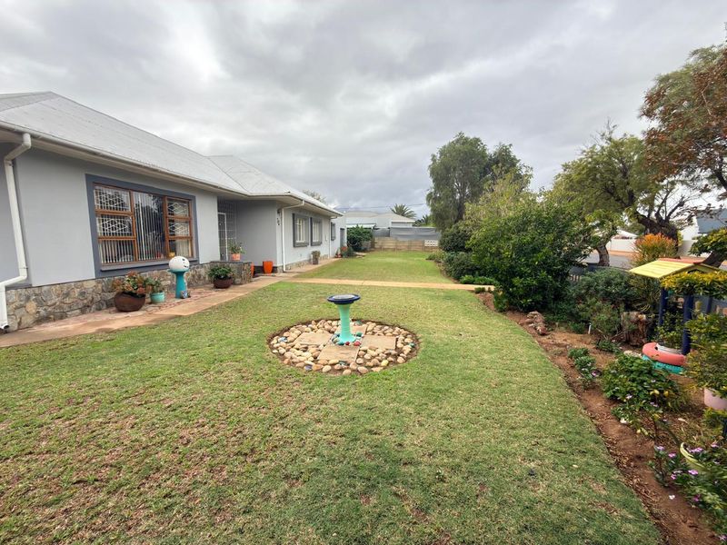 Spacious Corner Stand with Endless Potential in Rouxpark - Photo 2