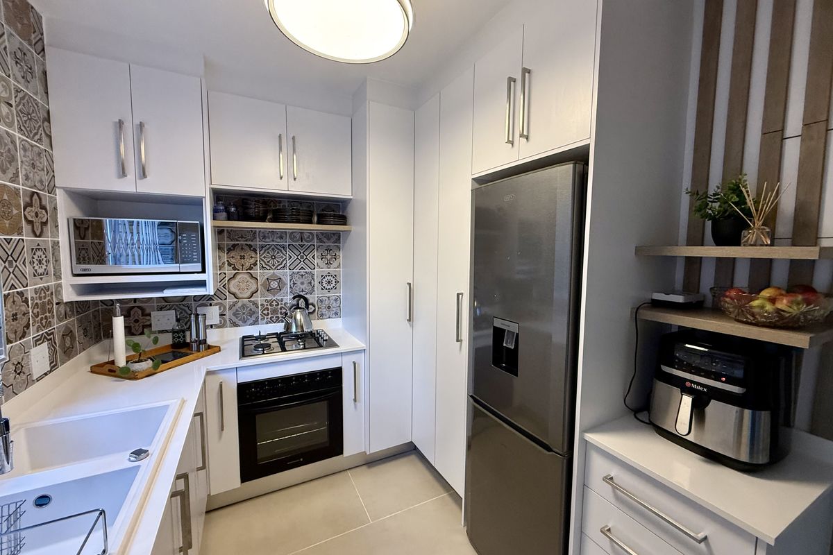 Modern Remodeled Home in a Secure Wonderboom Complex - Photo 2