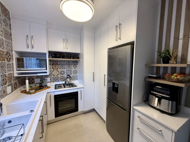 Modern Remodeled Home in a Secure Wonderboom Complex - Photo 2