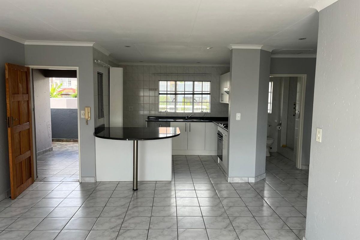 Modern 2 Bedroom First Floor Apartment with Garage in Secure Complex - Photo 2