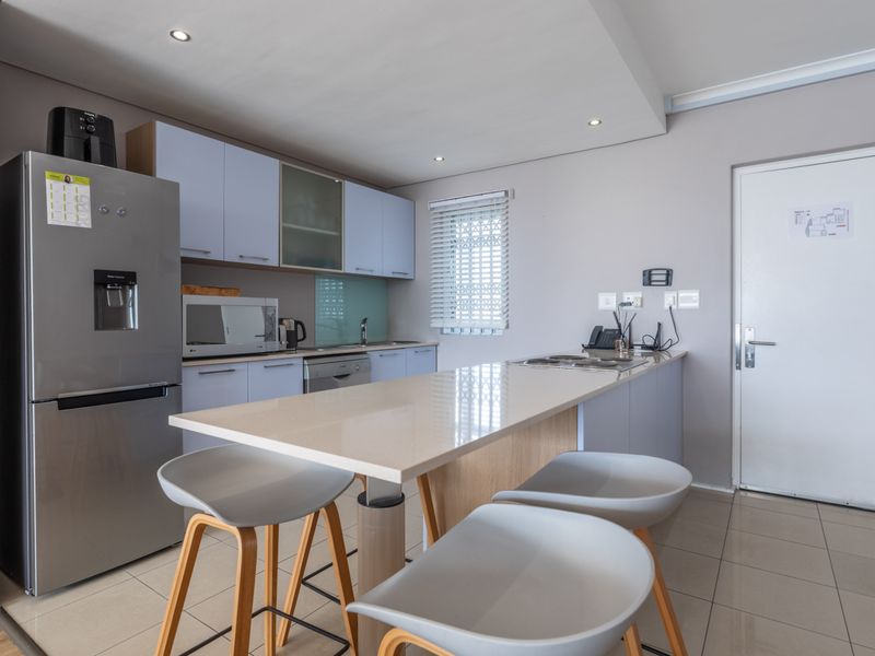 Beachfront Living in the Heart of Bloubergstrand - Photo 9