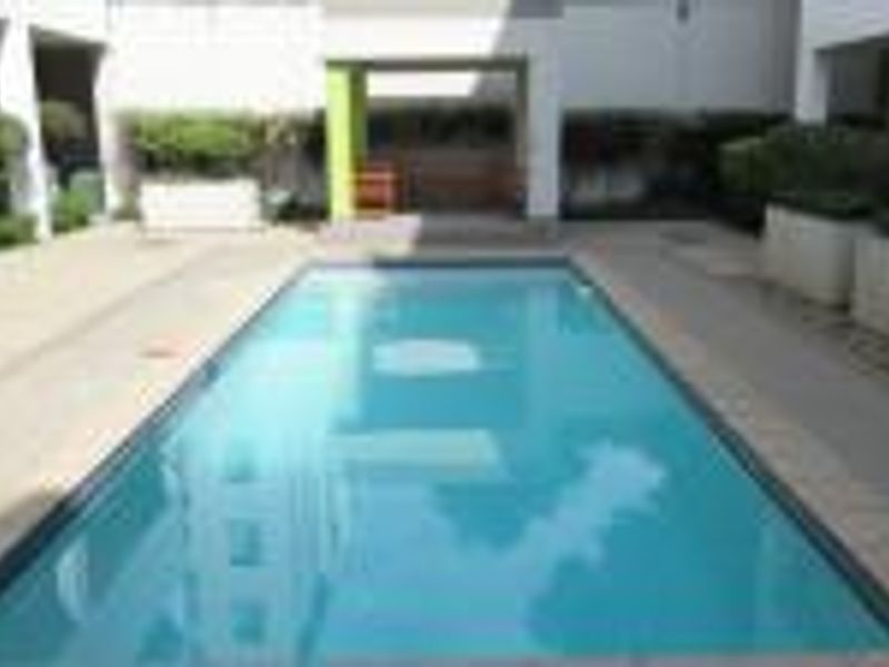 2-Bedroom Apartment for Sale | Balcony, Pool & Double Garage | Prime Location - Photo 2
