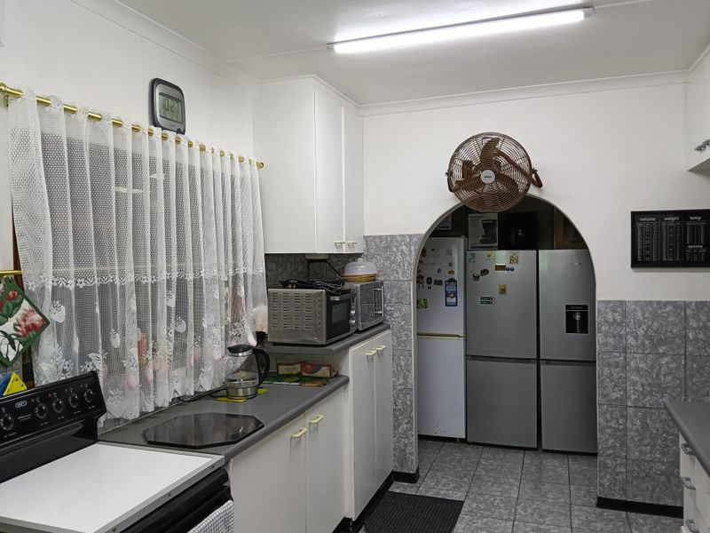 Spacious Property with Income-Generating Potential - Photo 6