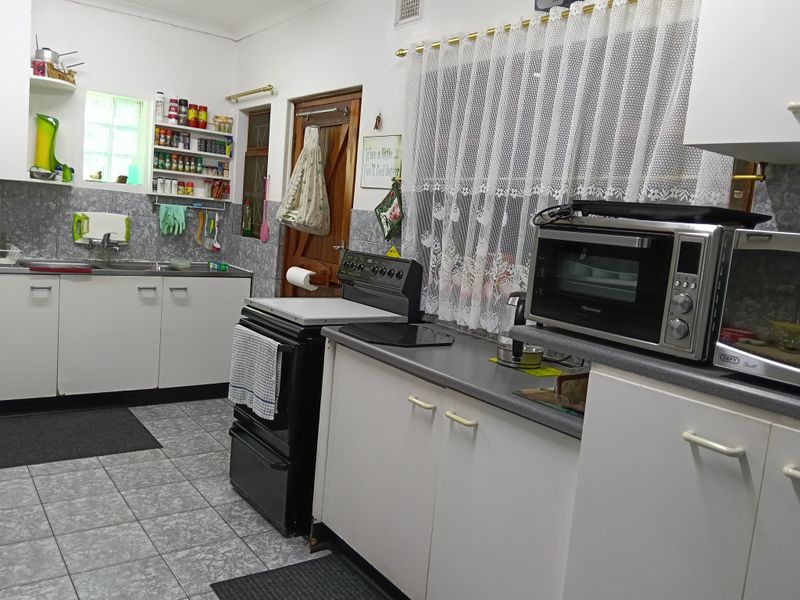 Spacious Property with Income-Generating Potential - Photo 7