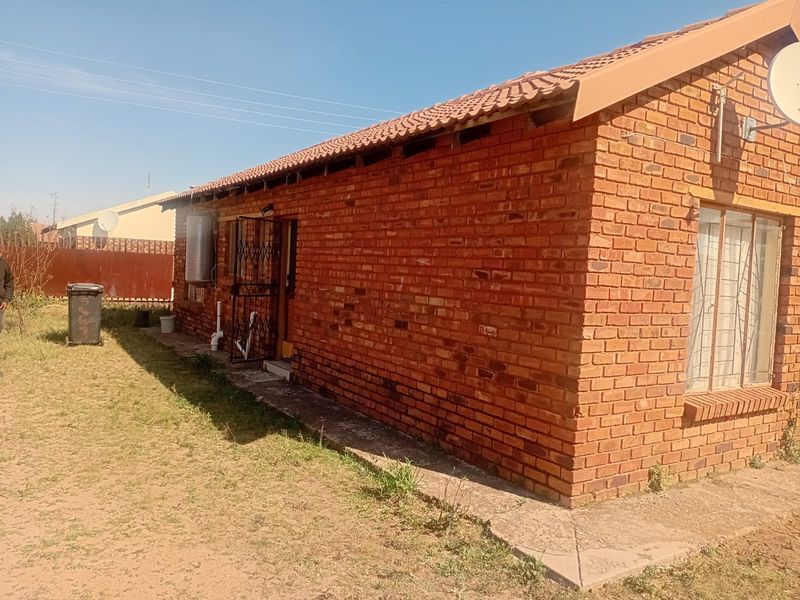 Family Home or Investment Opportunity in Sought-After Mmabatho - Photo 9