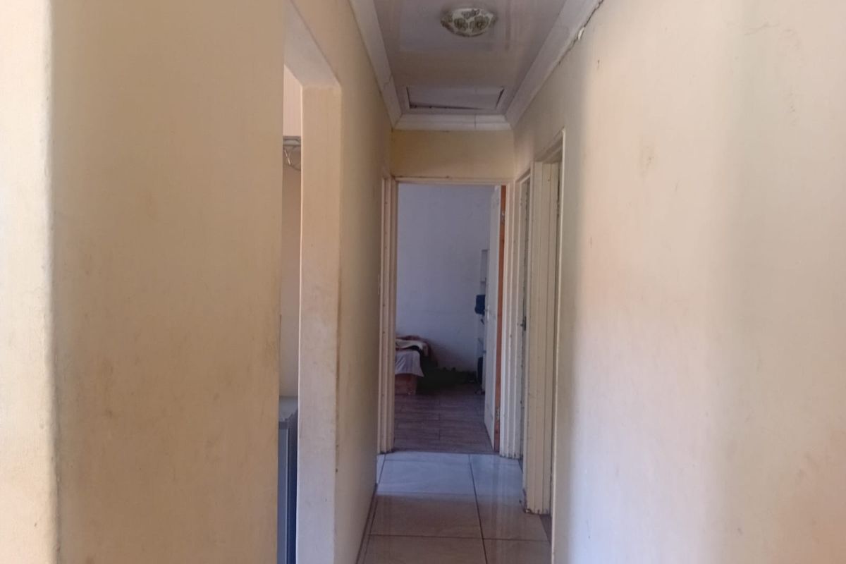Family Home or Investment Opportunity in Sought-After Mmabatho - Photo 4