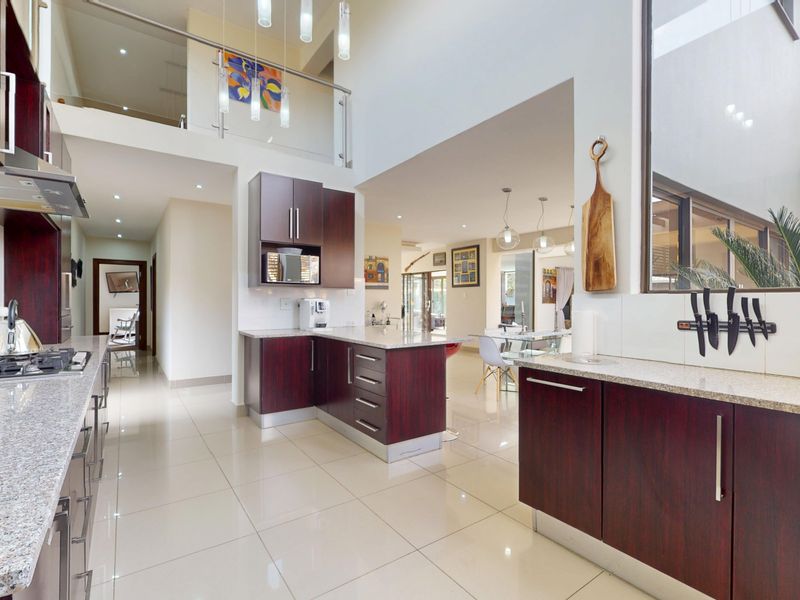 Luxury 4-Bedroom Entertainer’s Haven in a Secure Serengeti Nook - Photo 10