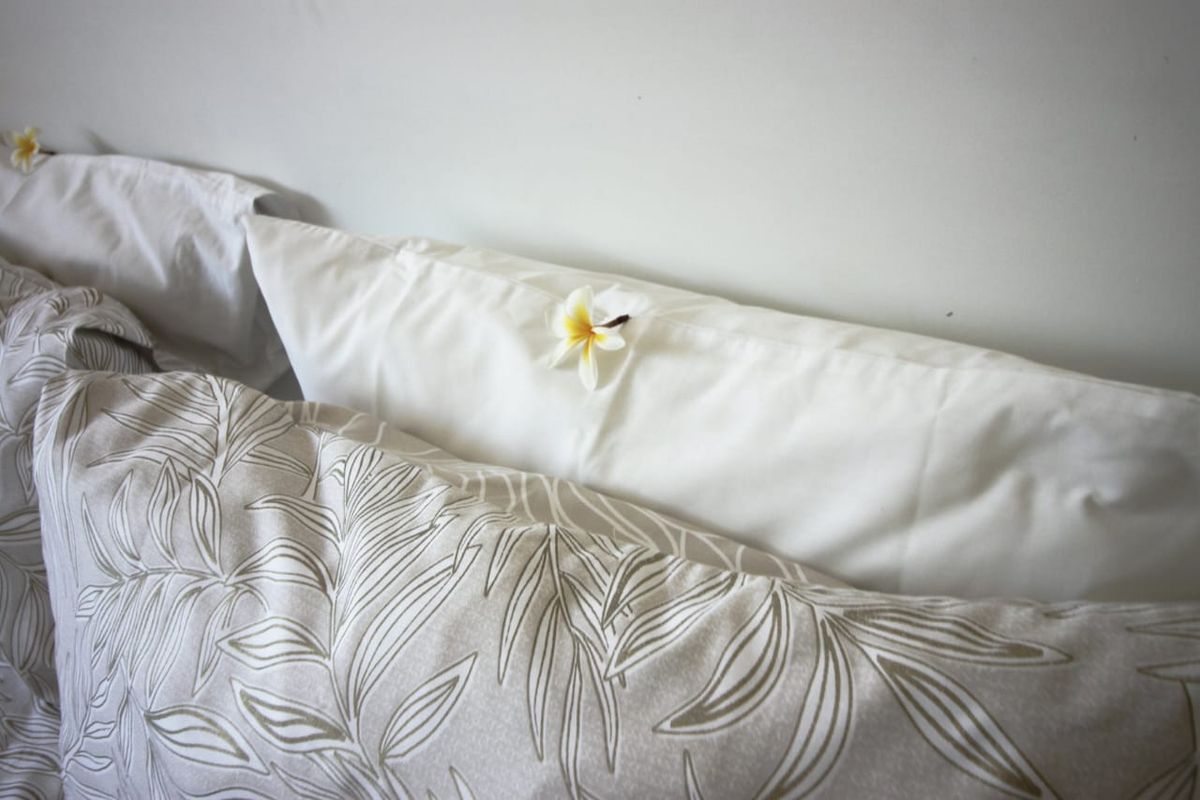 A close-up view of bedding in a bedroom setting.