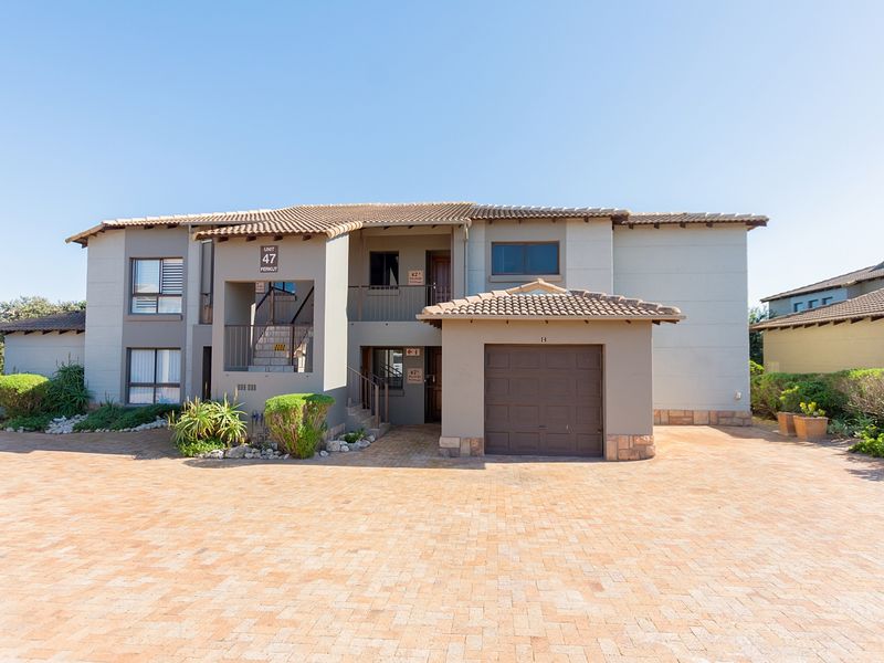 Clubhouse-Side Upstairs Apartment with Enclosed Braai Balcony - Photo 1