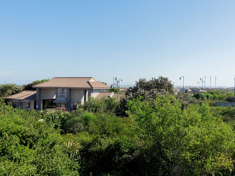 Clubhouse-Side Upstairs Apartment with Enclosed Braai Balcony - Photo 10