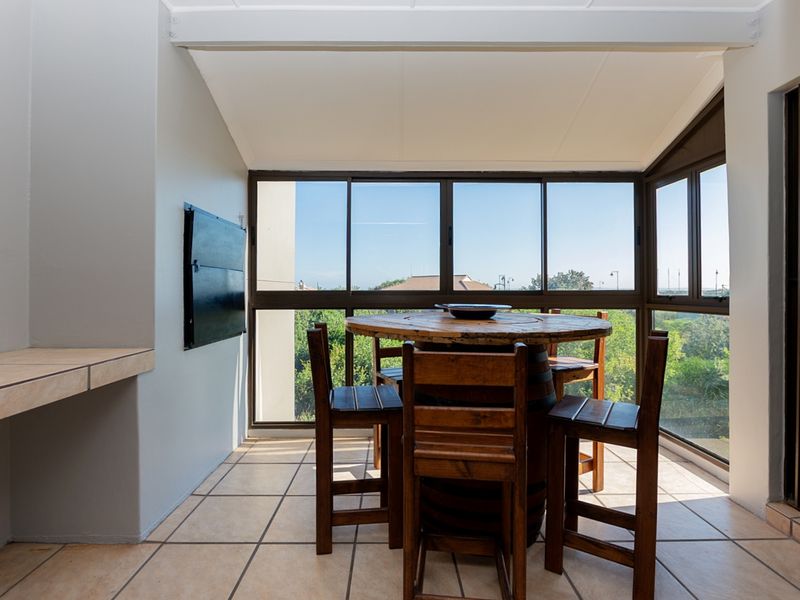 Clubhouse-Side Upstairs Apartment with Enclosed Braai Balcony - Photo 7