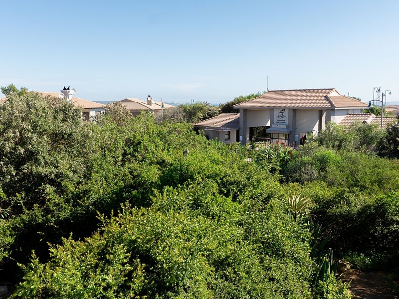 Clubhouse-Side Upstairs Apartment with Enclosed Braai Balcony - Photo 2