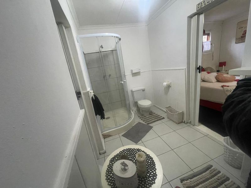 Fully Furnished 1-Bedroom Cottage with Flexible Space - Photo 8