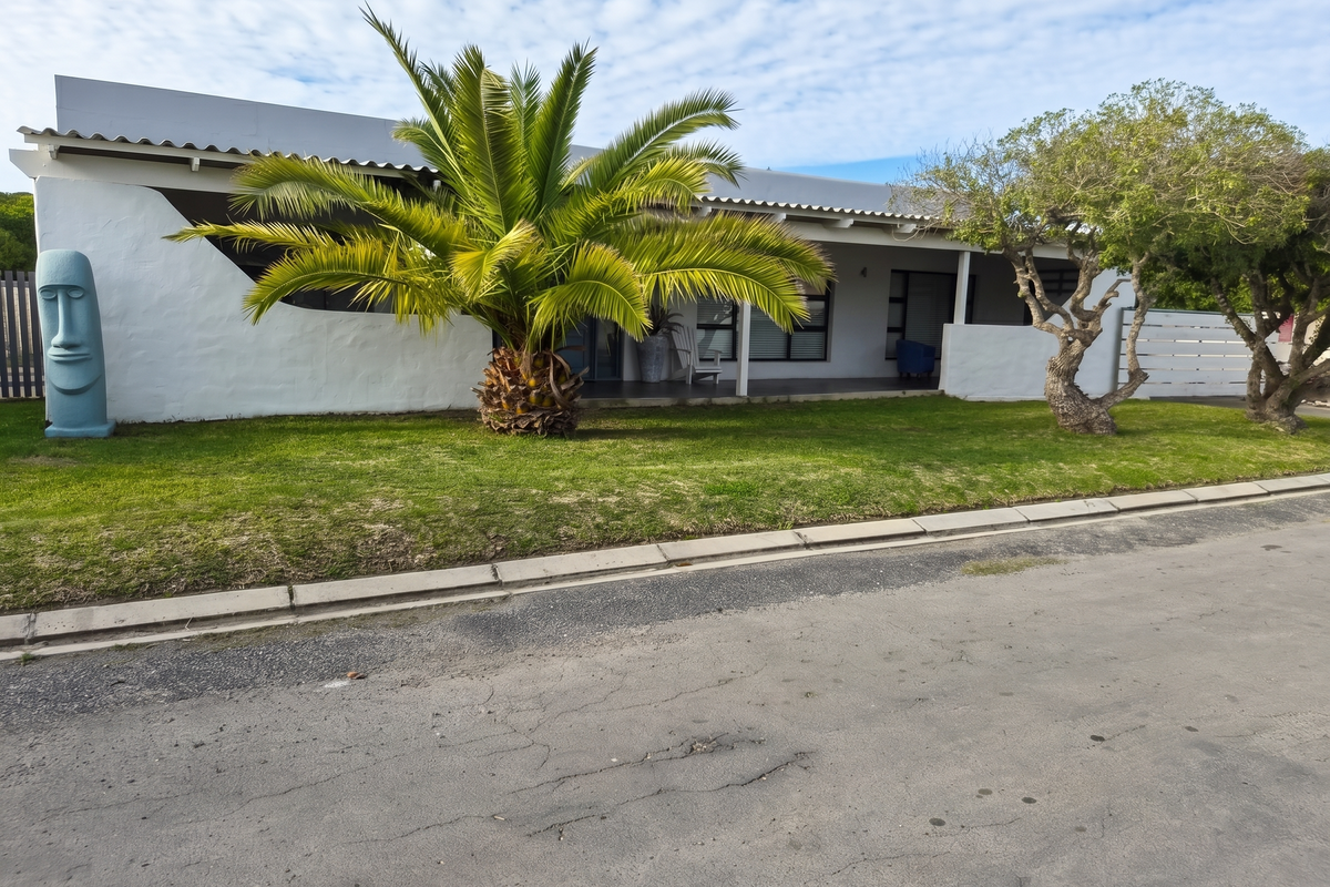 Spacious Coastal Home with Income-Generating Potential - Photo 4