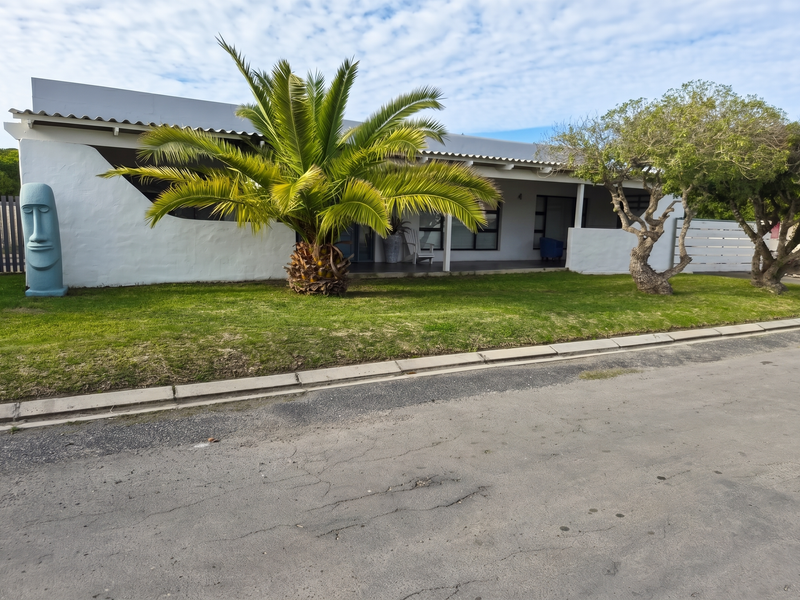 Spacious Coastal Home with Income-Generating Potential - Photo 4