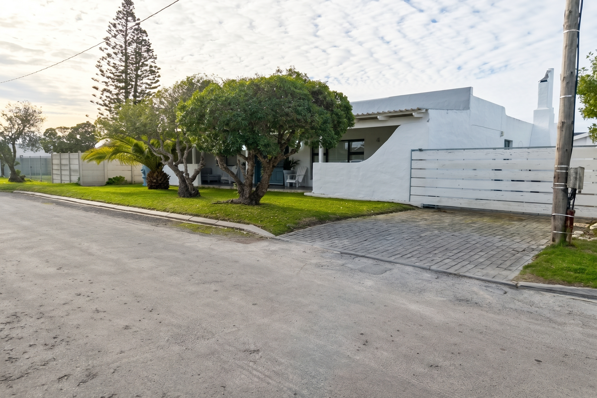 Spacious Coastal Home with Income-Generating Potential - Photo 5