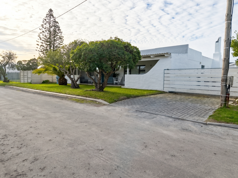 Spacious Coastal Home with Income-Generating Potential - Photo 5