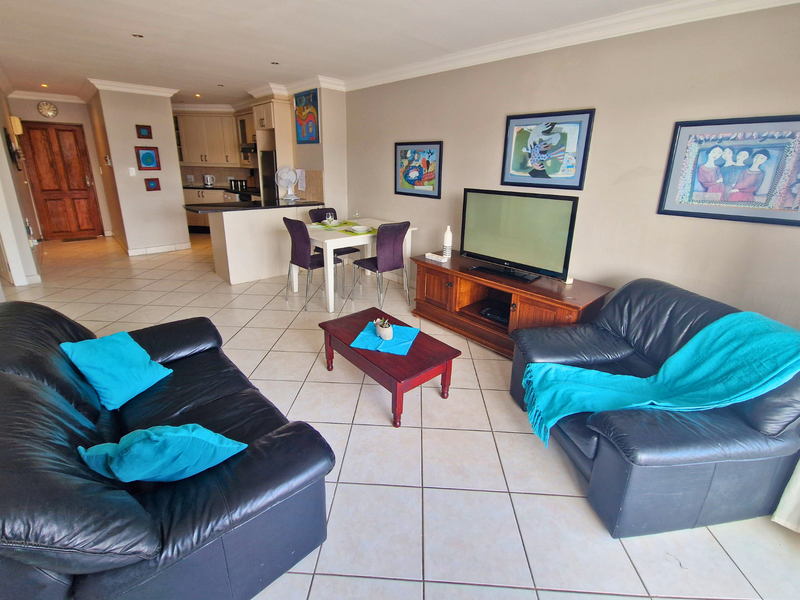 Modern Coastal Apartment Just Steps from the Beach - Photo 1