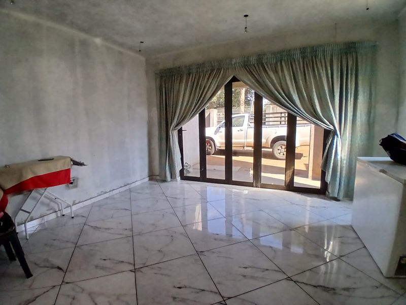 Experience luxury living in this magnificent double-storey home, designed with space and comfort. - Photo 6