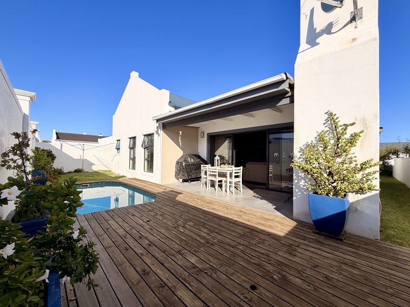 DUAL MANDATE | A Home Filled with Heart in Mooizicht Gardens, Sandbaai - Photo 1