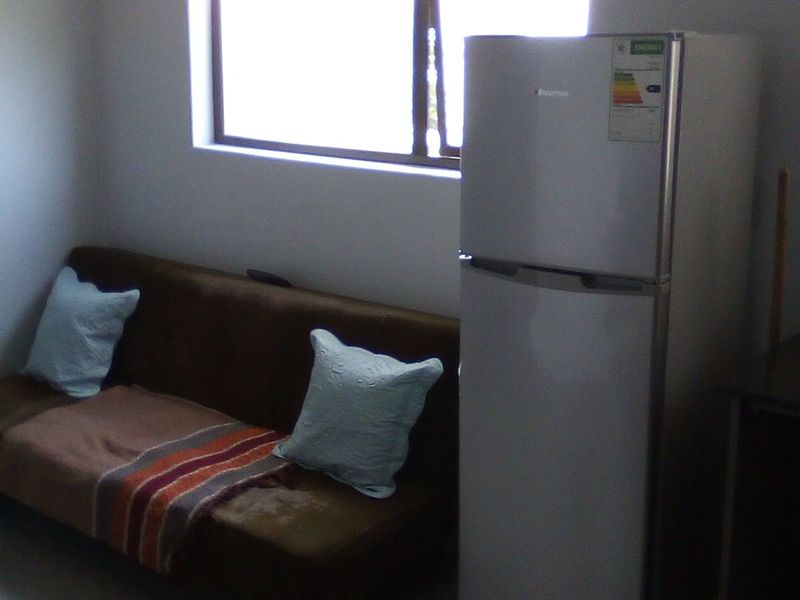 Beachfront Living – Secure 1-Bedroom Apartment - Photo 1