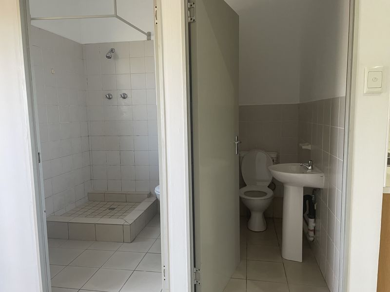 Three Bedroom Unit in Sought after Area - Photo 10