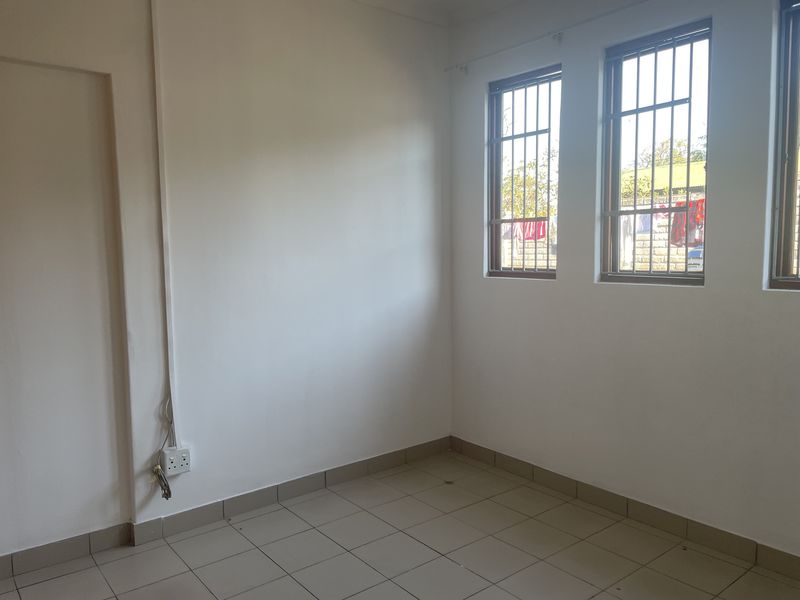 Three Bedroom Unit in Sought after Area - Photo 8