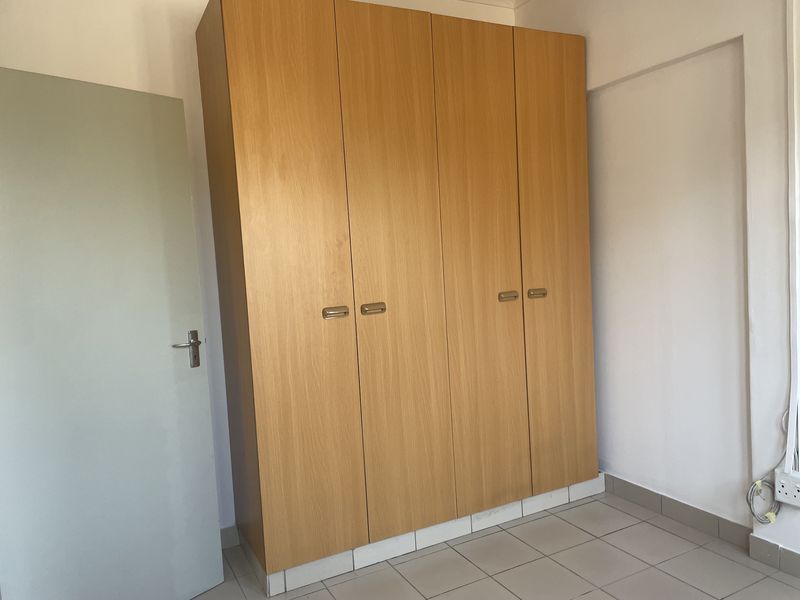 Three Bedroom Unit in Sought after Area - Photo 9