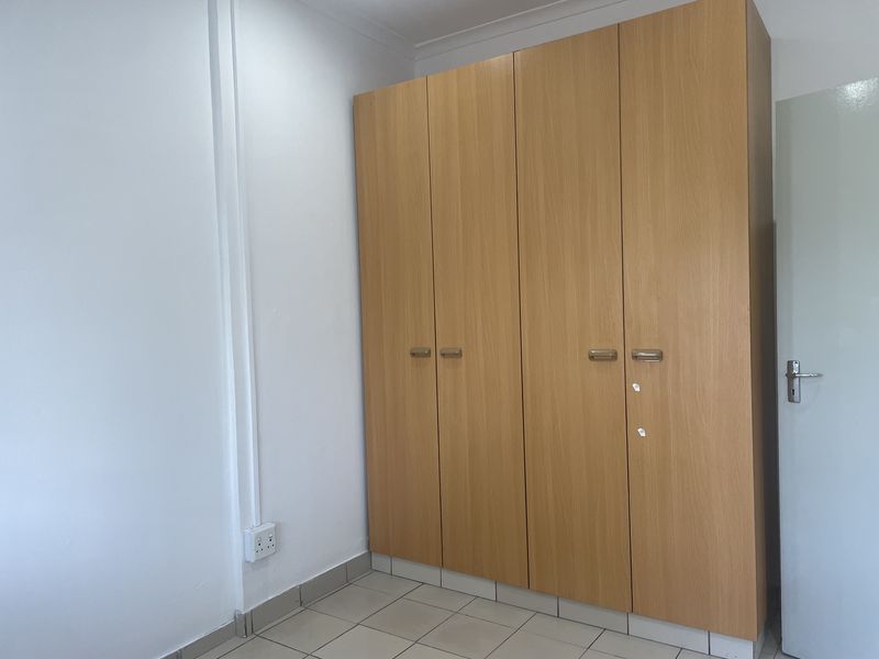 Three Bedroom Unit in Sought after Area - Photo 5