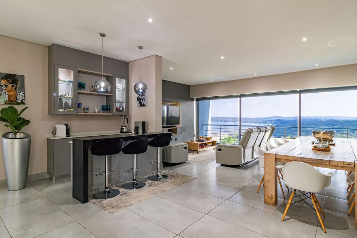 Serene, Modern Luxury Living with Breathtaking Dam View - Photo 3