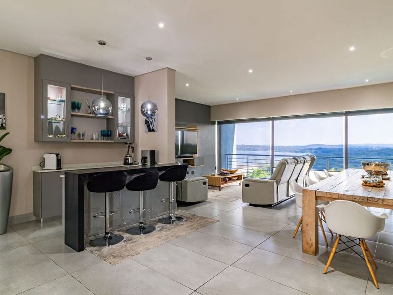 Serene, Modern Luxury Living with Breathtaking Dam View - Photo 3