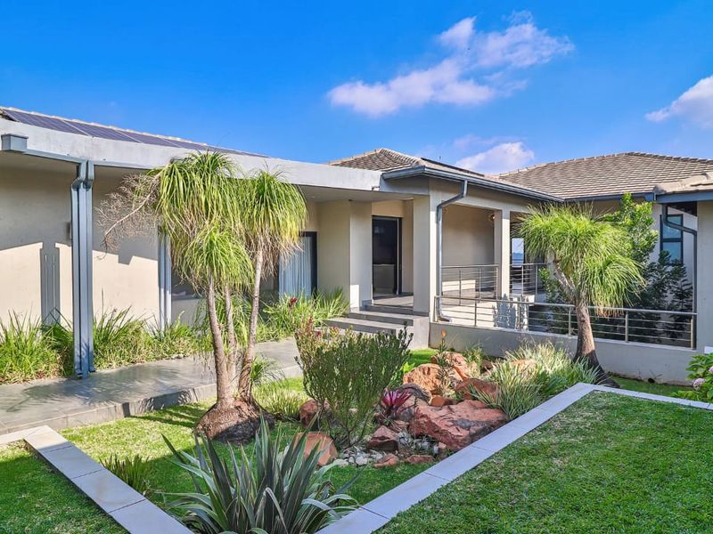 Serene, Modern Luxury Living with Breathtaking Dam View - Photo 2