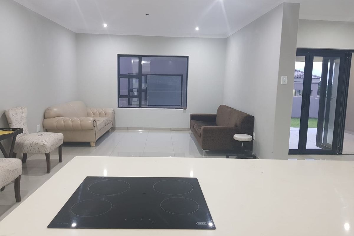 Spacious Family Home in a Popular Estate at the Foot of the Magaliesberg - Photo 3