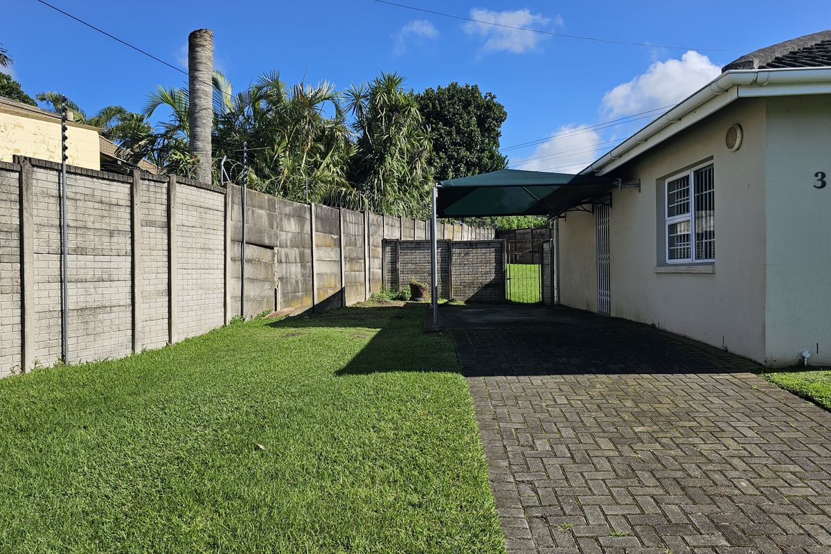 MOVE IN READY! Spacious Corner Townhouse with Huge Yard and Endless Potential! - Photo 3