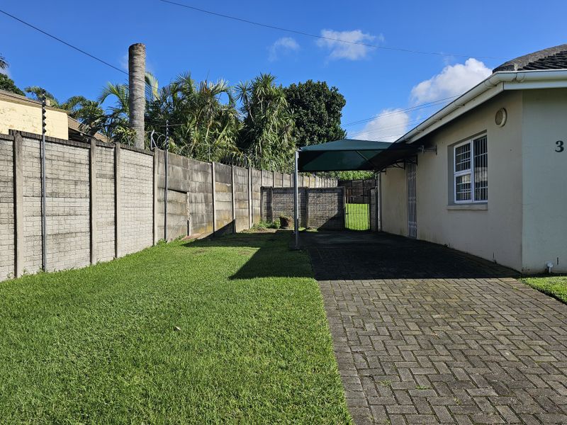 MOVE IN READY! Spacious Corner Townhouse with Huge Yard and Endless Potential! - Photo 3