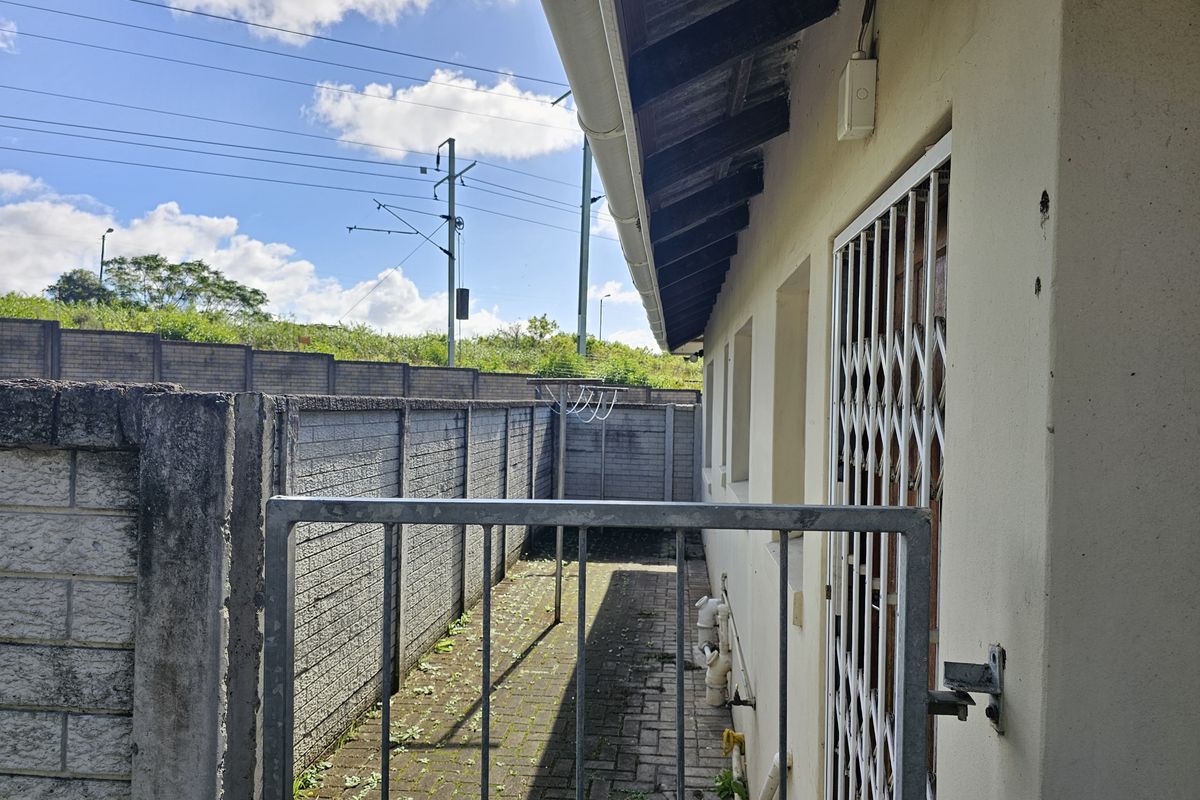 MOVE IN READY! Spacious Corner Townhouse with Huge Yard and Endless Potential! - Photo 4