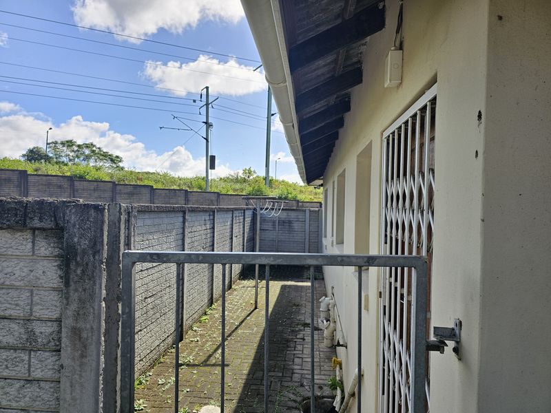 MOVE IN READY! Spacious Corner Townhouse with Huge Yard and Endless Potential! - Photo 4