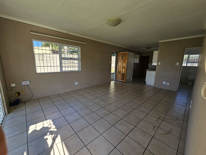 MOVE IN READY! Spacious Corner Townhouse with Huge Yard and Endless Potential! - Photo 9