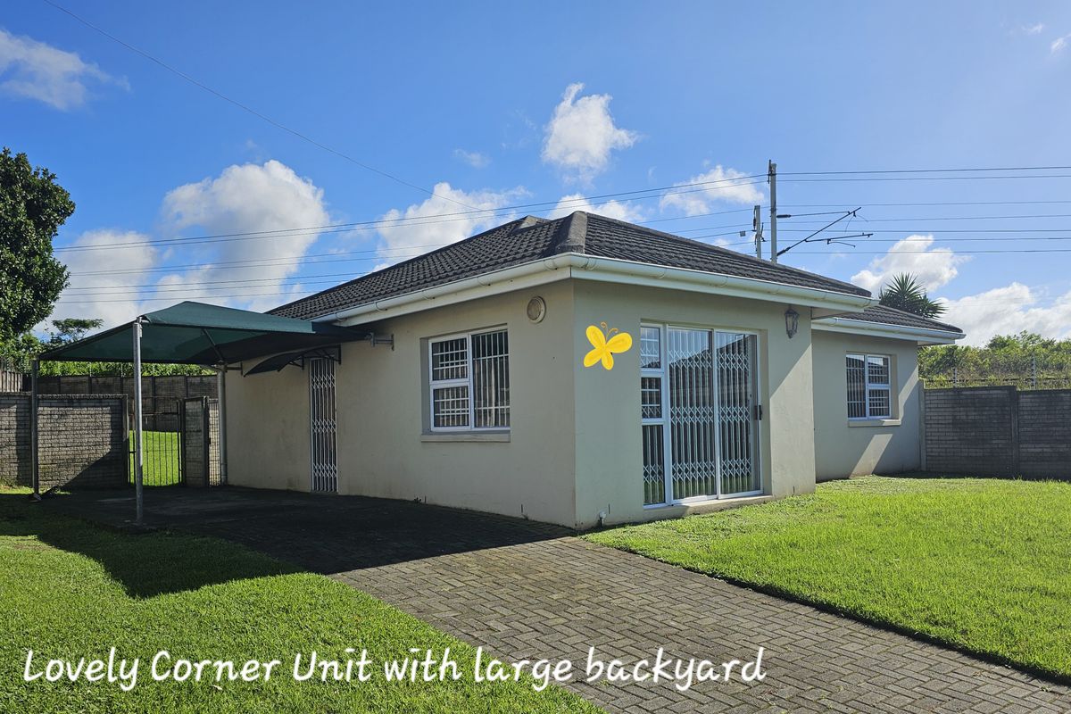 MOVE IN READY! Spacious Corner Townhouse with Huge Yard and Endless Potential! - Photo 2