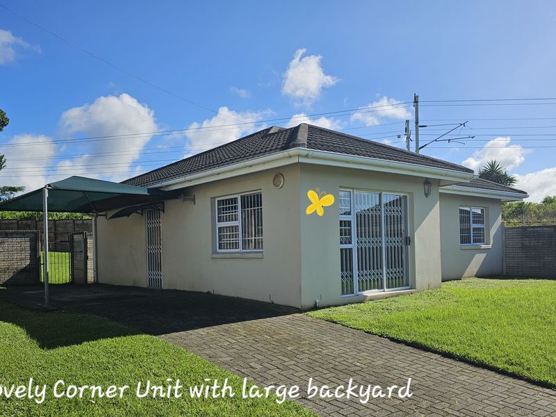 MOVE IN READY! Spacious Corner Townhouse with Huge Yard and Endless Potential! - Photo 2