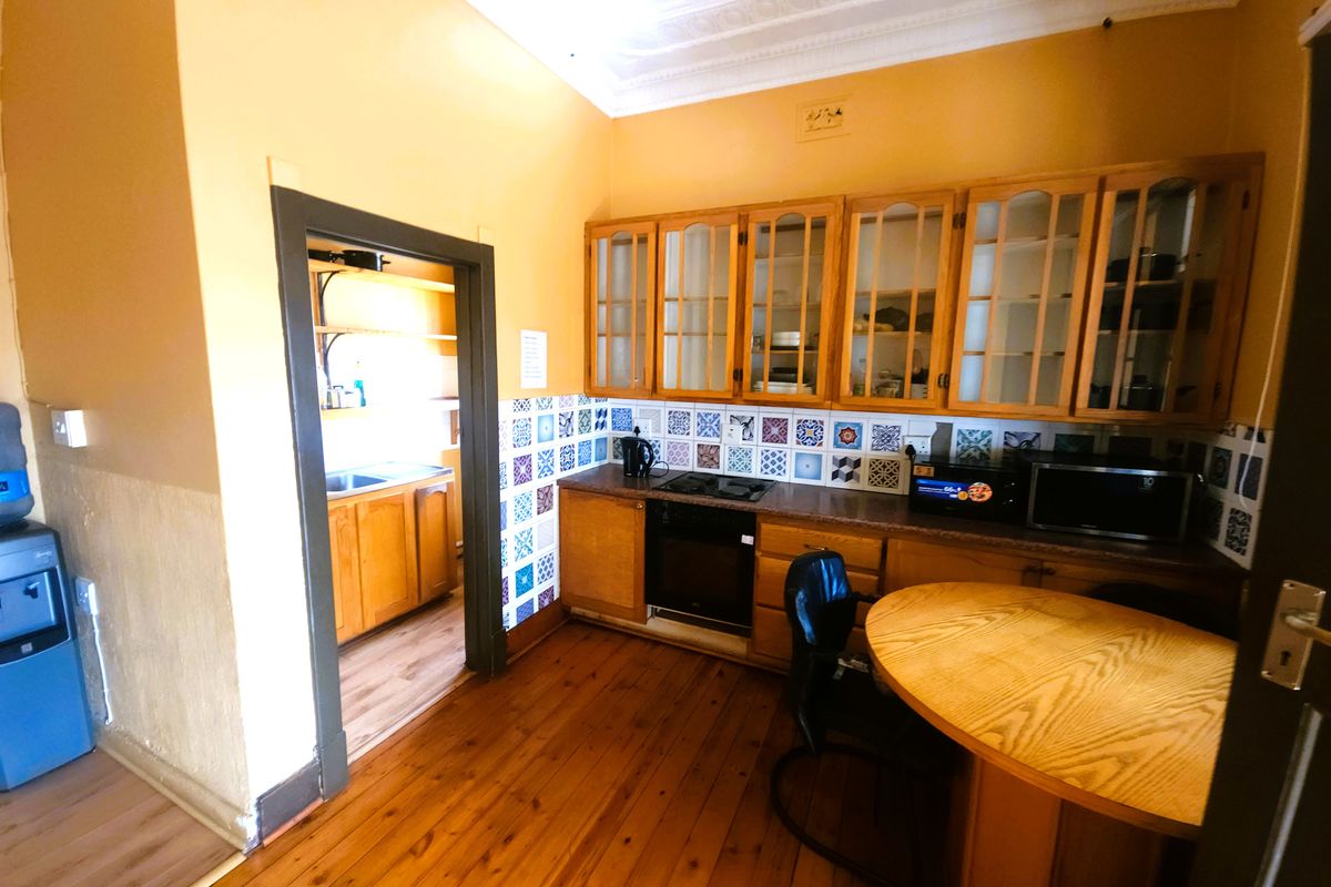 Versatile Kensington Gem: A Classic Family Home with Income-Generating Potential - Photo 3
