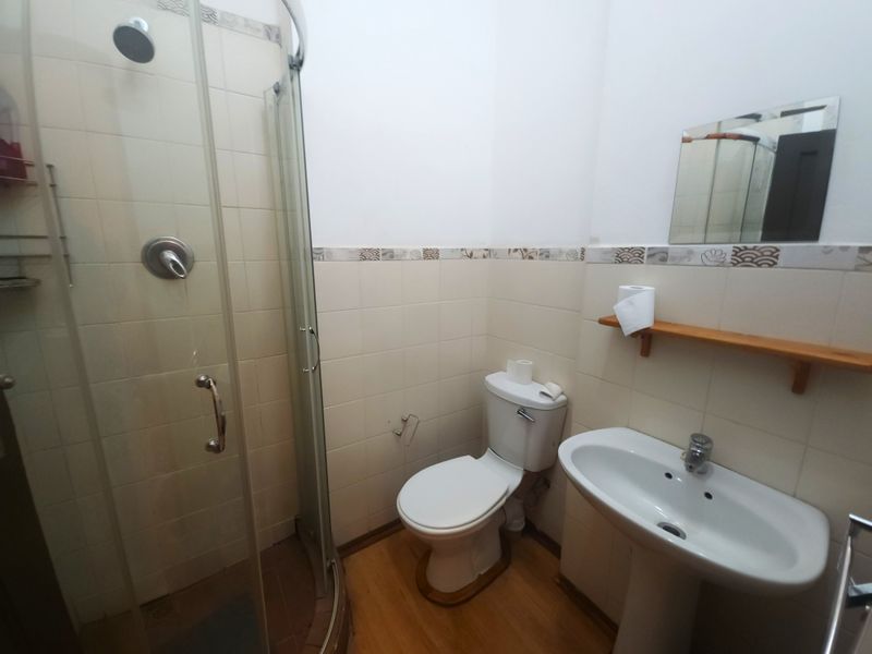 Versatile Kensington Gem: A Classic Family Home with Income-Generating Potential - Photo 9