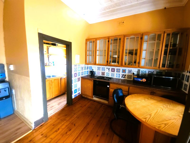 Versatile Kensington Gem: A Classic Family Home with Income-Generating Potential - Photo 2