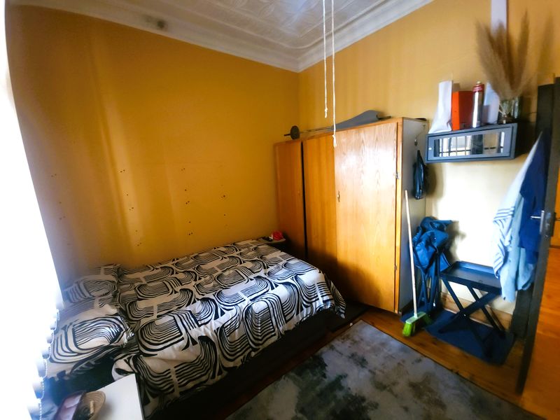 Versatile Kensington Gem: A Classic Family Home with Income-Generating Potential - Photo 7